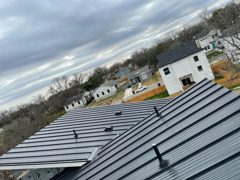 Standing seam metal roof panels with vents for Skylight Repair in Harwood Heights